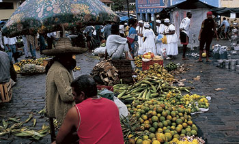 market place in brazil with fruit vendors and women shopping